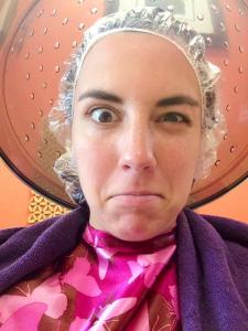 I think they kept her under the dryer too long.