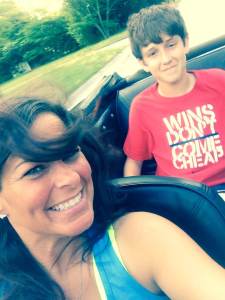 Mother and son tooling around in the convertible