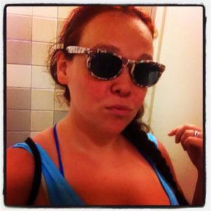 She took this as her first public bathroom selfie!